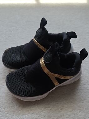 Kids Nike Black and Gold Slip-On Athletic Shoes